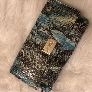 Patent Quilted Python Leather Clutch